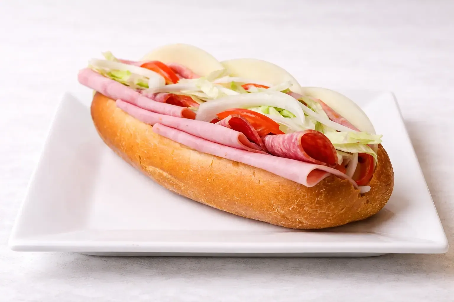Italian hoagie with ham, salami, capicola, sweet peppers and cheese