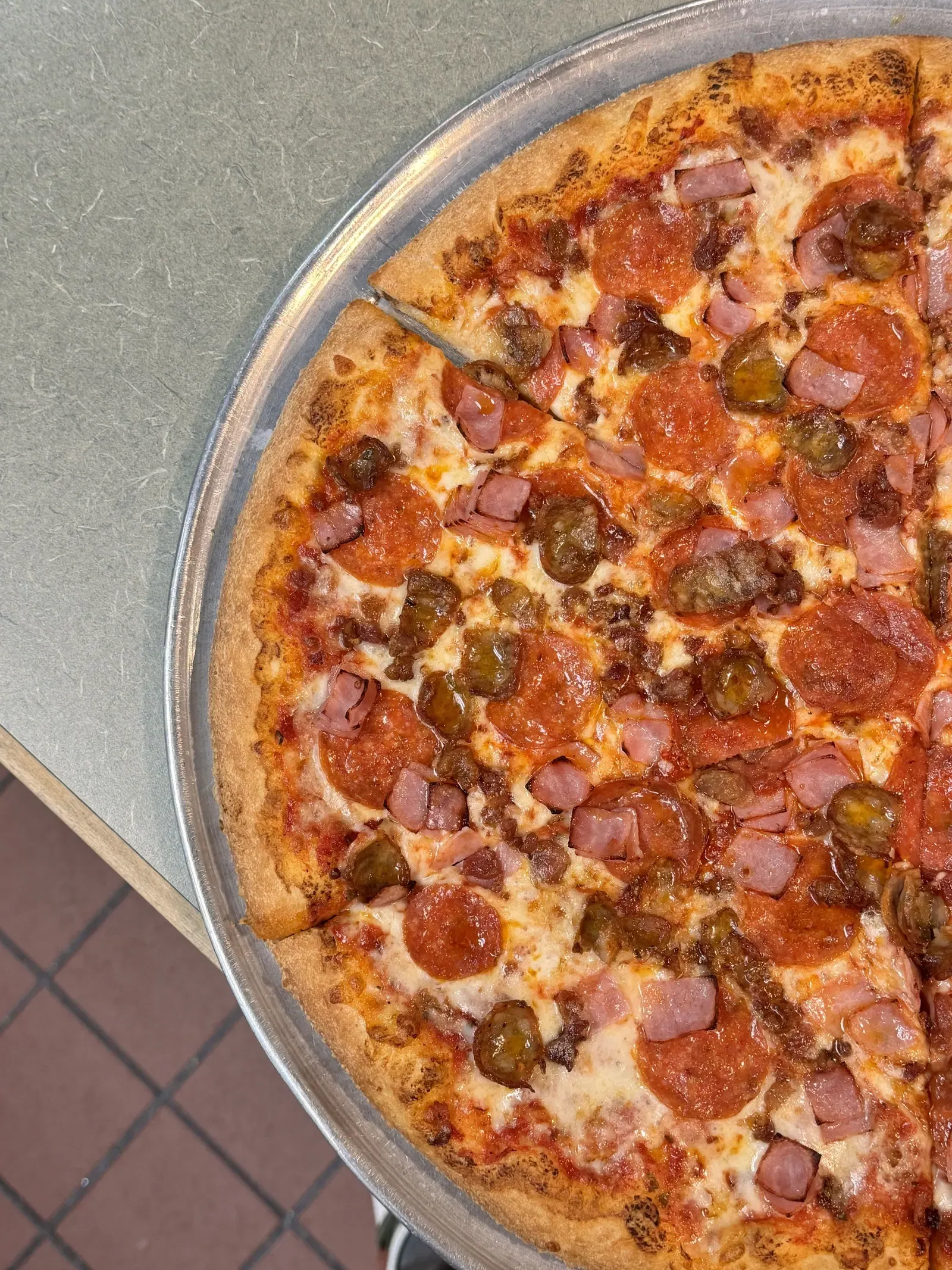 Naples meat lover's pizza with pepperoni, sausage and meatballs at Rudy's in Newark, DE