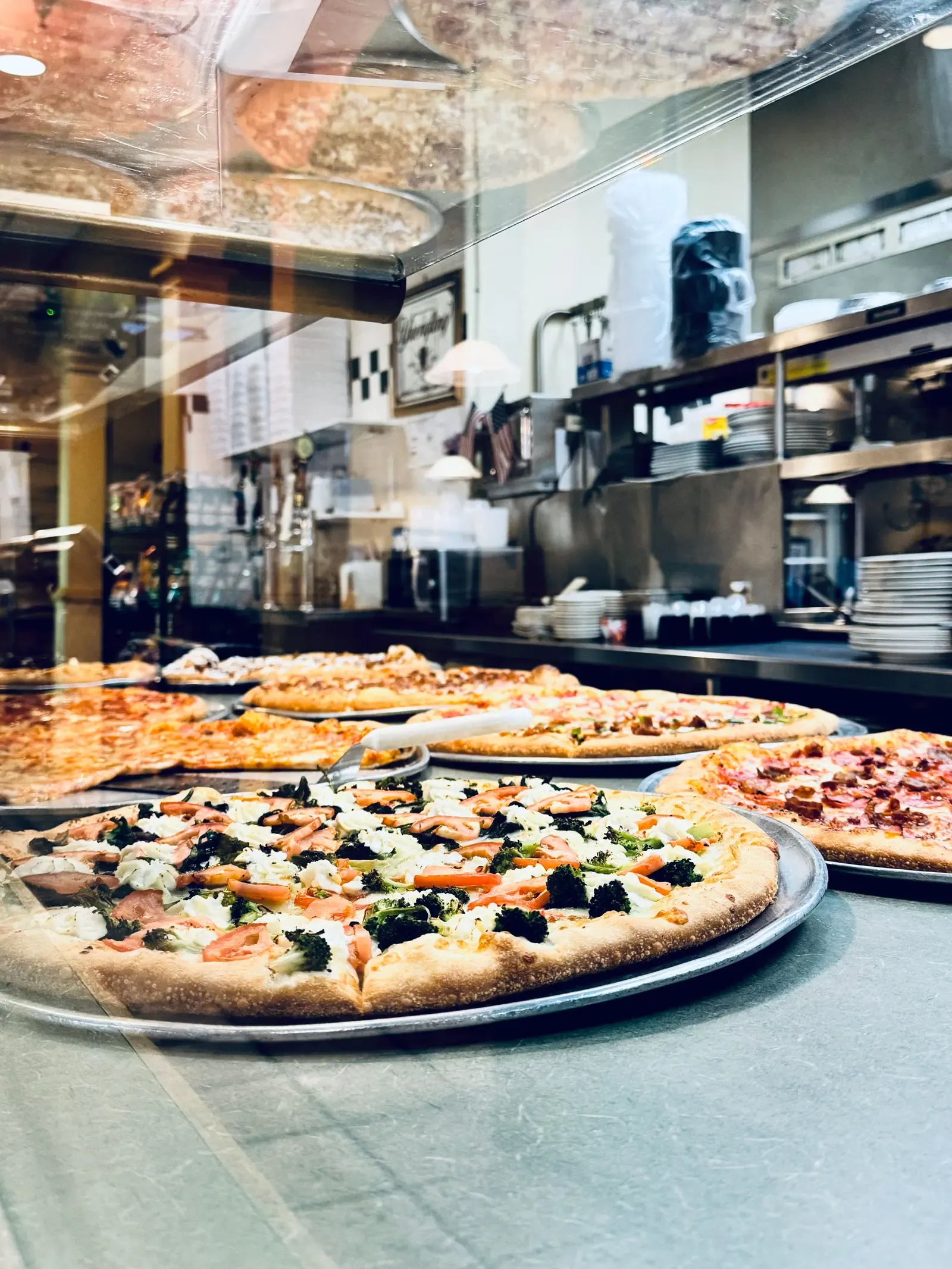 Hand-tossed pizza fresh from the oven at Rudy's in Newark, DE